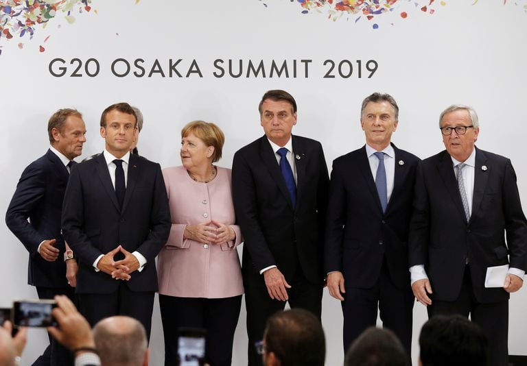 Emmanuel Macron, Angela Merkel, Jair Bolsonaro, Mauricio Macri y Jean-Claude Juncker, en la última cumbre presencial del G-20, en Japón, en 2019