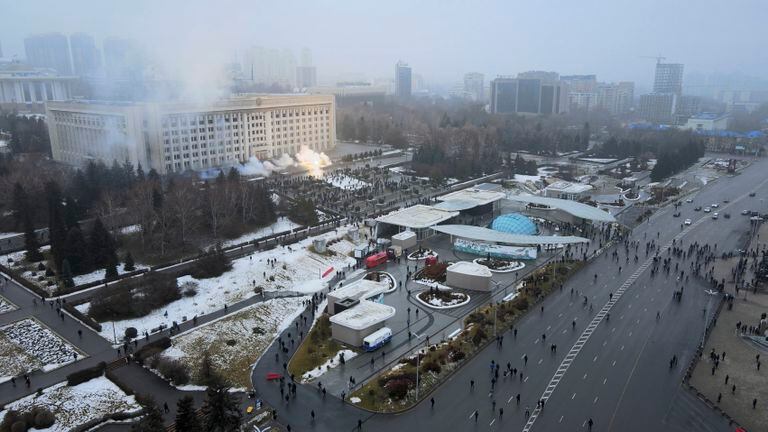 Smoke rises from the city hall of Almaty, Kazakhstan