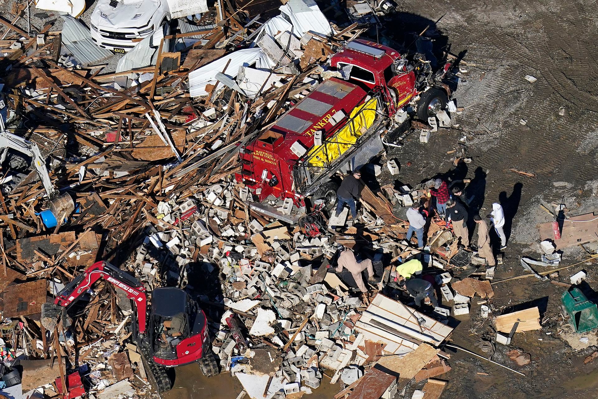 Rescue workers are working to locate the survivors through the rubble