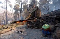 “Las pérdidas son totales”, dijo el dueño de un barrio de montaña devastado por los incendios