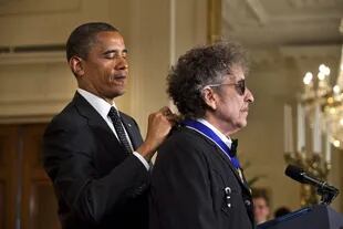 Con Barack Obama, cuando el expresidente de los Estados Unidos le entregó la Medalla de la Libertad, en mayo de 2012