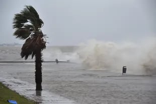 Waves break on the Rambla de Montevideo during the passage of a subtropical cyclone