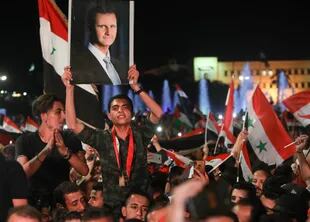 Los festejos en Damasco por el triunfo de Al-Assad