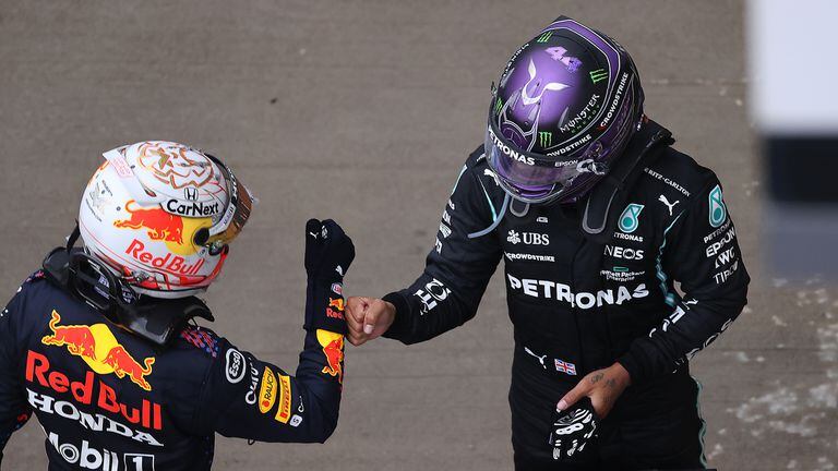 SOCHI, RUSSIA - SEPTEMBER 26: Race winner Lewis Hamilton of Great Britain and Mercedes GP celebrates with second placed Max Verstappen of Netherlands and Red Bull Racing in parc ferme during the F1 Grand Prix of Russia at Sochi Autodrom on September 26, 2021 in Sochi, Russia. (Photo by Lars Baron - Formula 1/Formula 1 via Getty Images)