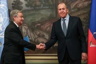 Russian Foreign Minister Sergey Lavrov, right, and U.N. Secretary-General Antonio Guterres shake hands during their meeting in Moscow, Russia, Tuesday, April 26, 2022. (Maxim Shipenkov/Pool Photo via AP)