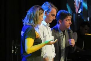Bolsonaro con su esposa Michelle y el pastor Josué, en la iglesia evangelista a la que asisten