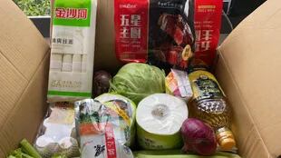 Cebollas, repollo, huevos, tofu y aceite, entre los productos alimenticios que le proveyeron las autoridades shanghainesas.