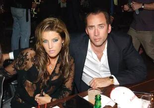 Lisa Marie Presley and Nicolas Cage (Photo by L. Busacca/WireImage)