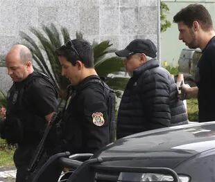 Mantega, ayer, al llegar a la sede de la policía, en San Pablo