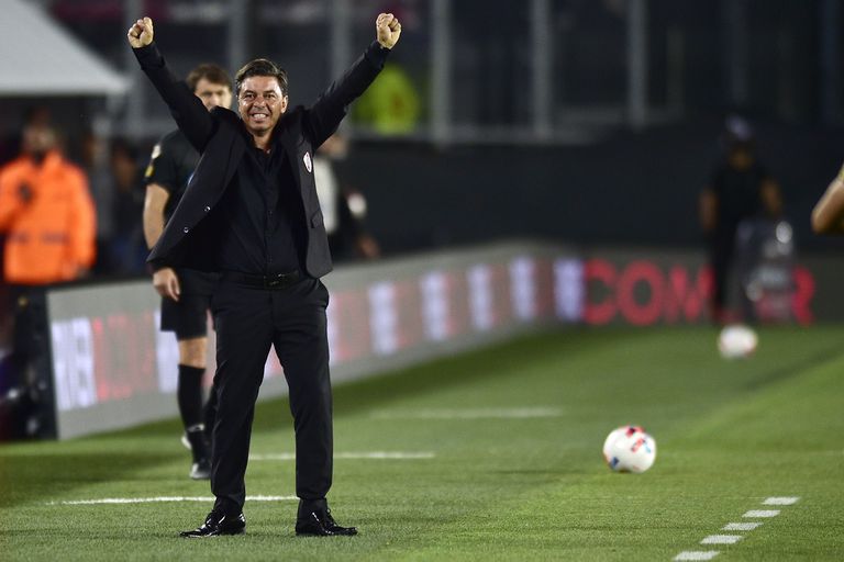 River Plate's coach Marcelo Gallardo celebrates his team's firs goal during a match of the local soccer tournament against Racing Club at Monumental stadium in Buenos Aires, Argentina Thursday, Nov. 25, 2021. (AP Photo/Gustavo Garello)