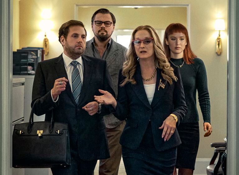 In this image released by Netflix, from left, Jonah Hill, Leonardo DiCaprio, Meryl Streep and Jennifer Lawrence in a scene from "Don't Look Up".  (Niko Tavernise/Netflix via AP)