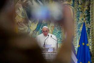 Pope Francis delivers his speech during a meeting with authorities at the Presidential Palace in Athens.
