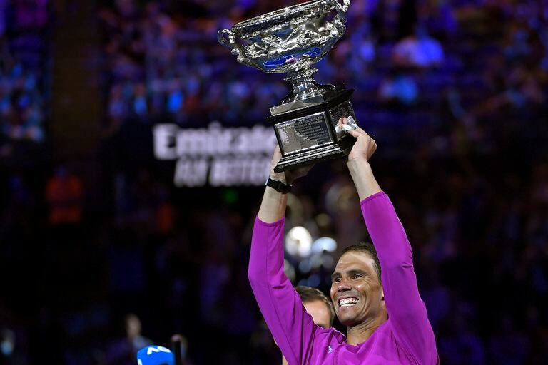 Rafael Nadal lifts the Australian trophy, the 21st major of his career