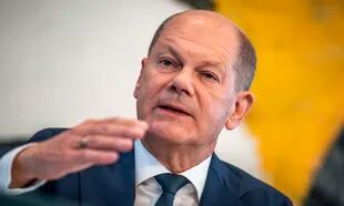 German Chancellor Olaf Scholz (SPD) attends a press conference after a consultation of the SPD, Greens and FDP at the coalition meeting in Berlin, Germany, Saturday, September 4, 2022.  (Michael Kappeler/ dpa via AP)