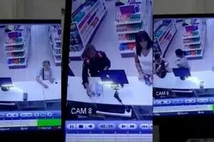 Una policía le robó el celular a una mujer en una farmacia