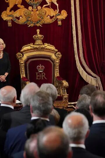 Britain's Prince William, Camilla, the Queen Consort and King Charles III address members of the Privy Council in the Throne Room during the Council of Accession at St James's Palace