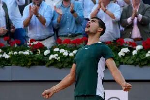 Carlos Alcaraz of Spain celebrates after winning the final against Alexander Zverev at the Madrid Open 