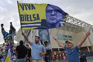 "Viva Bielsa": Leeds fans wave a flag at the Elland Road gate.