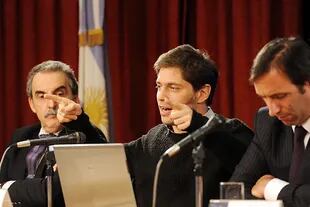 Moreno, Kicillof y Lorenzino durante una conferencia en el Ministerio de Economía