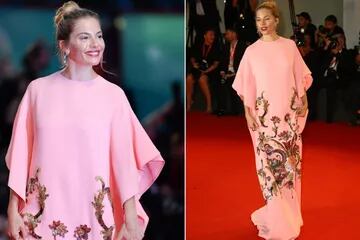 Alfombra roja I. Sienna Miller lució muy sonriente en Venecia con un vestido largo, rosa pálido, con unos bordados dorados, creación de Gucci