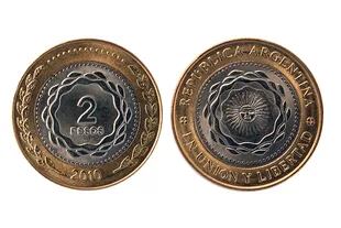 Diseño de la cara y seca de las nuevas monedas de dos pesos