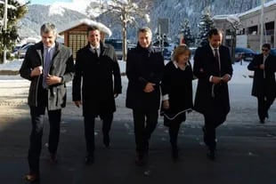 Marcos Peña, Sergio Massa y Mauricio Macri en Davos, en 2016