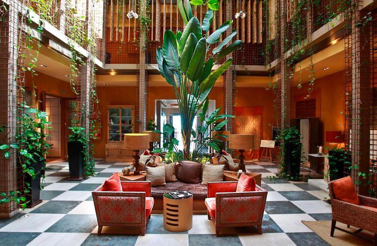 The hotel lobby full of wild plants