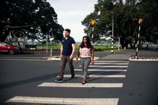 Lamia Imam, a New Zealander, and her American husband, Cody Sandel, in Auckland, New Zealand, on May 7, 2021. They had always planned to return to New Zealand, but their move was hastened by the pandemic and the political situation in the United States.  (Cornell Tukiri/The New York Times)