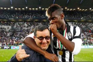 Mino Raiola, Paul Pogba's agent -with him in the photo- and Zlatan Ibrahimovic among many others;  he passed away recently, aged 54