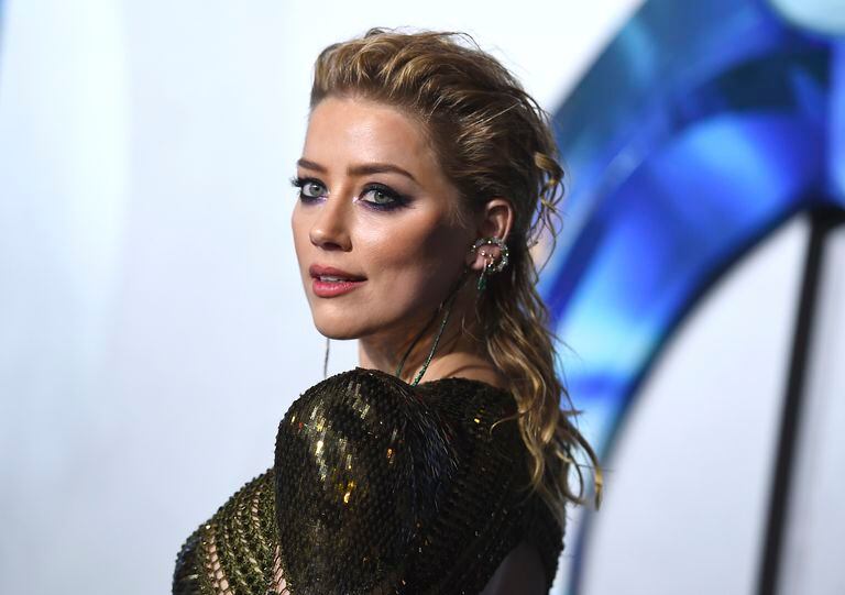 Amber Heard llega al estreno de "Aquaman" el 12 de diciembre de 2018 en Los Angeles (Crédito: Jordan Strauss/Invision/AP, archivo)