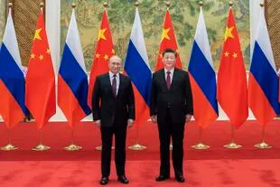 Presiden Rusia Vladimir Putin dan Presiden China Xi Jinping berfoto selama pertemuan di Beijing pada 4 Februari 2022. (Li Tao dari Kantor Berita Xinhua China, via AP, File)