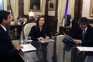 Amado Boudou y Ricardo Echegaray junto a Cristina Fernández de Kirchner