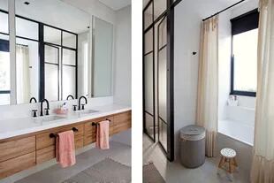 El baño tiene mueble de madera y bacha doble con canillas ‘Logic’ (Thol). Detrás, la bañadera y la ducha con división de aluminio con vidrio repartido.