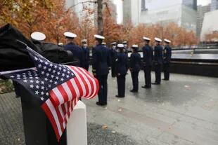 Members of the United States Coast Guard honor the veterans killed in the September 11 attacks in New York City on Veterans Day