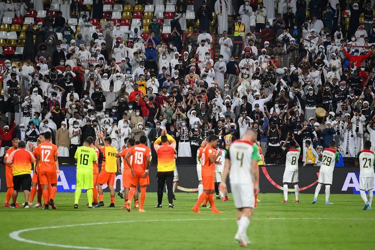 The Cinderella of the Club World Cup: the players of AS Pirae, from Tahiti, applaud the spectators after losing 4-1 to Al Jazira, from the United Arab Emirates