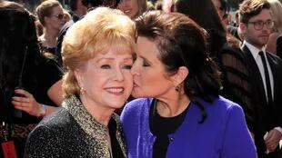 Fisher junto a su madre, la también actriz Debbie Reynolds