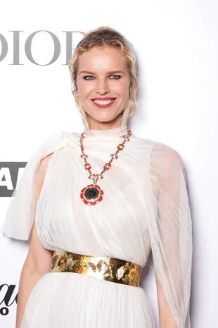 A day earlier, the Czech top opted for a Greek-inspired dress by Dior, XL gold belt and cape.