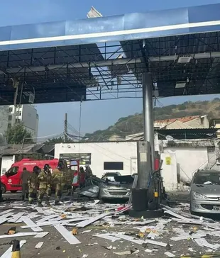 The explosion affected the roof of the service station and the peugeot car