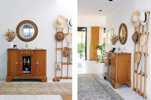 Un mueble heredado convive con un perchero de madera de líneas contemporáneas y un espejo circular. A la afortunada mezcla de estilos se suma la alfombra floreada en pasteles (Lejano Oriente).