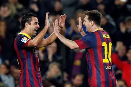Tiempos felices de Xavi y Messi en Barcelona