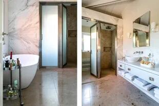 La apariencia monocromática de este baño en suite se diluye al contacto con las texturas del mármol y los matices de la luz.