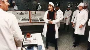 A bizarre picture: Angela Merkel, Germany's then environment minister, visits the Chernobyl plant in 1996.  He and the journalists and workers who came with him have exposed their faces and hands inside the facility.