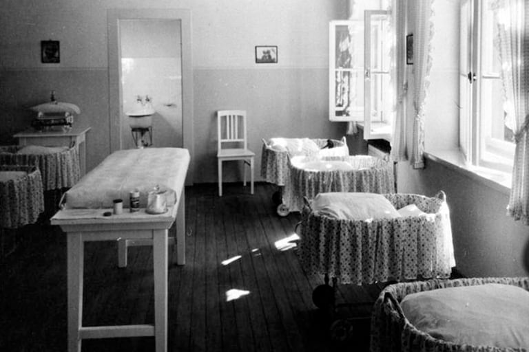 The interior of a nursery from the play Lebensborn where mothers and children lived for months