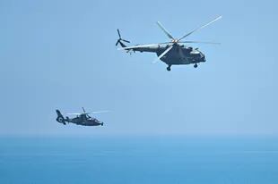Chinese military helicopters fly near Pingtan Island, one of China's closest points to Taiwan 