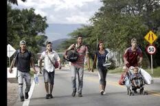 Una caminata de valientes que huyen de la miseria de Venezuela