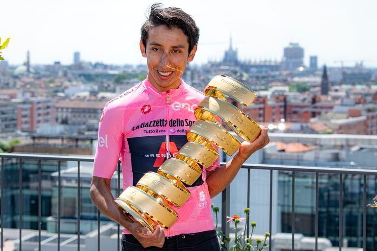 Colombian cyclist Egan Bernal poses with his trophy a day after winning the Giro d'Italia, in Milan, Italy, Monday, May 31, 2021. (Gian Mattia D'Alberto/LaPresse via AP)