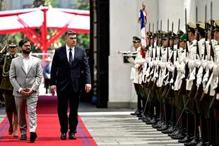 Chilean President Gabriel Boric And Croatian President Zoran Milanovic Arrive At The La Moneda Presidential Palace During Milanovic'S Official Visit To Chile On December 12, 2022 In Santiago.