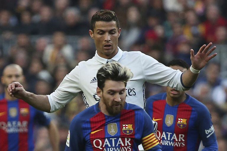 3/12/16. Cristiano Ronaldo del Real Madrid y Lionel Messi de Barcelona en acción durante el "Clásico".