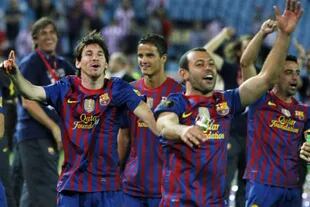 Mascherano con Leo Messi y Xavi en el Barcelona