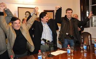 El exgobernador de Misiones Carlos Rovira y el ministro del Interior, Florencio Randazzo, festejan la reelección del gobernador Maurice Closs